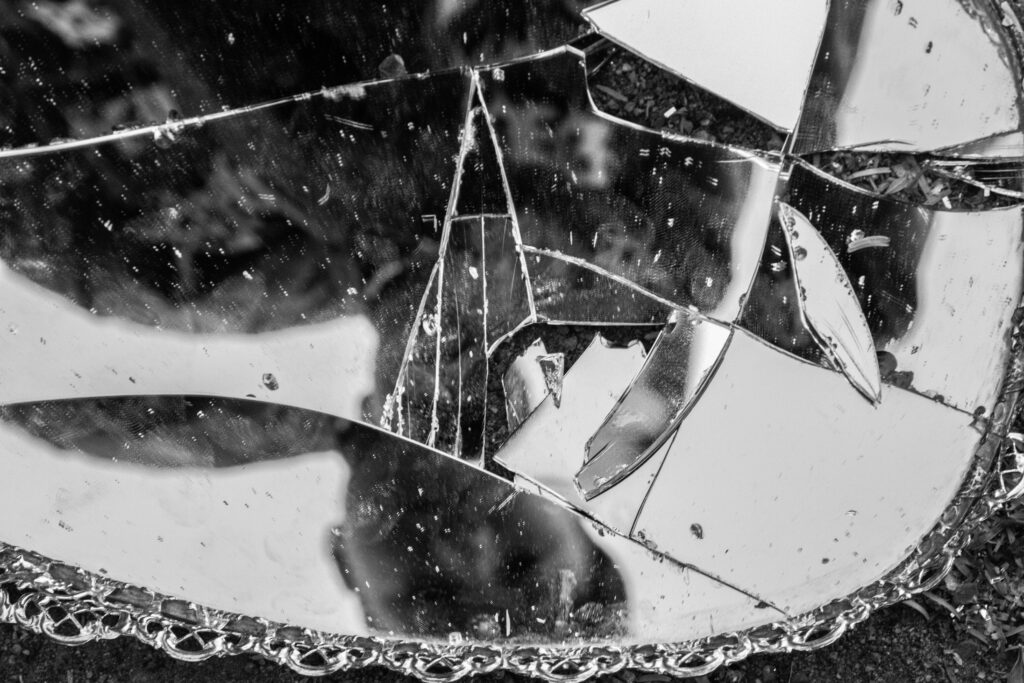 Broken mirror as a symbolisation of trauma